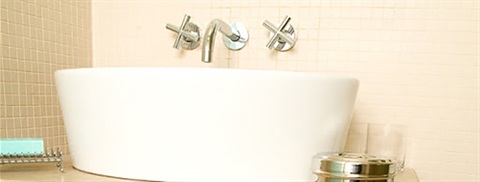 Hotel room bathroom with sink. 
